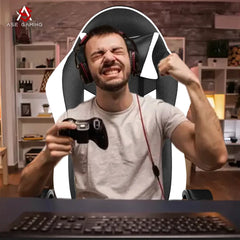 Person celebrating in ASE Gaming chair white and black while holding a gaming controller
